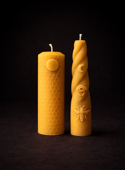Minimalist beeswax candles by Ra Lumière with clean shapes and warm natural glow
