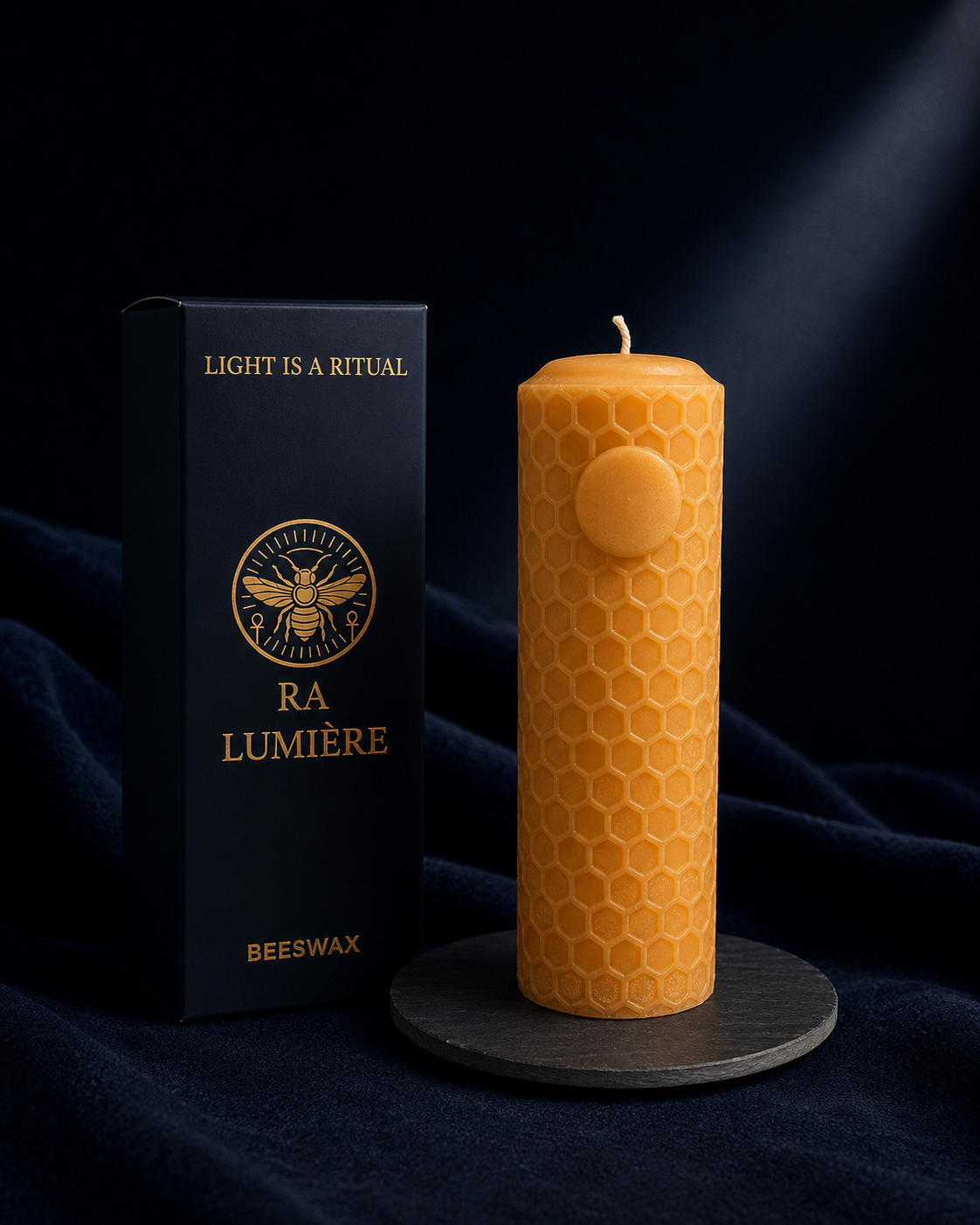 Ra beeswax candle with honeycomb pattern and sun symbol by Ra Lumière