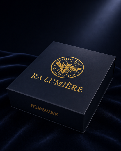 Ra Lumière luxury beeswax candle gift box in midnight blue with gold foil bee emblem